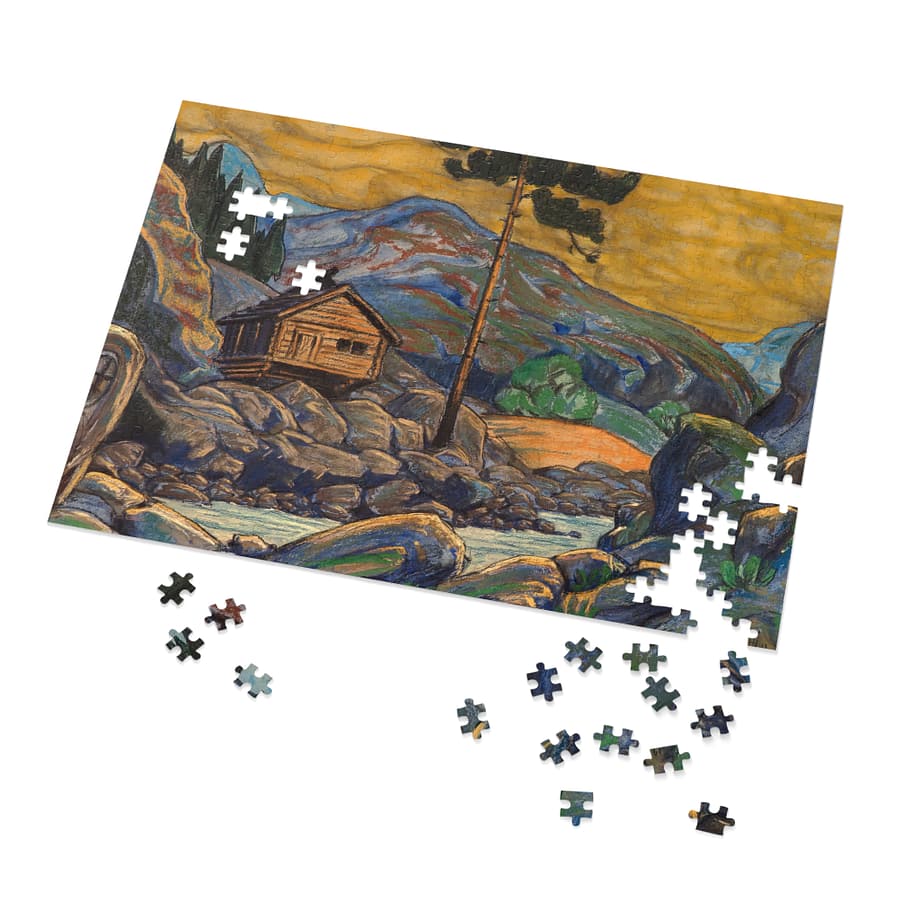 a puzzle with a house on the rocks